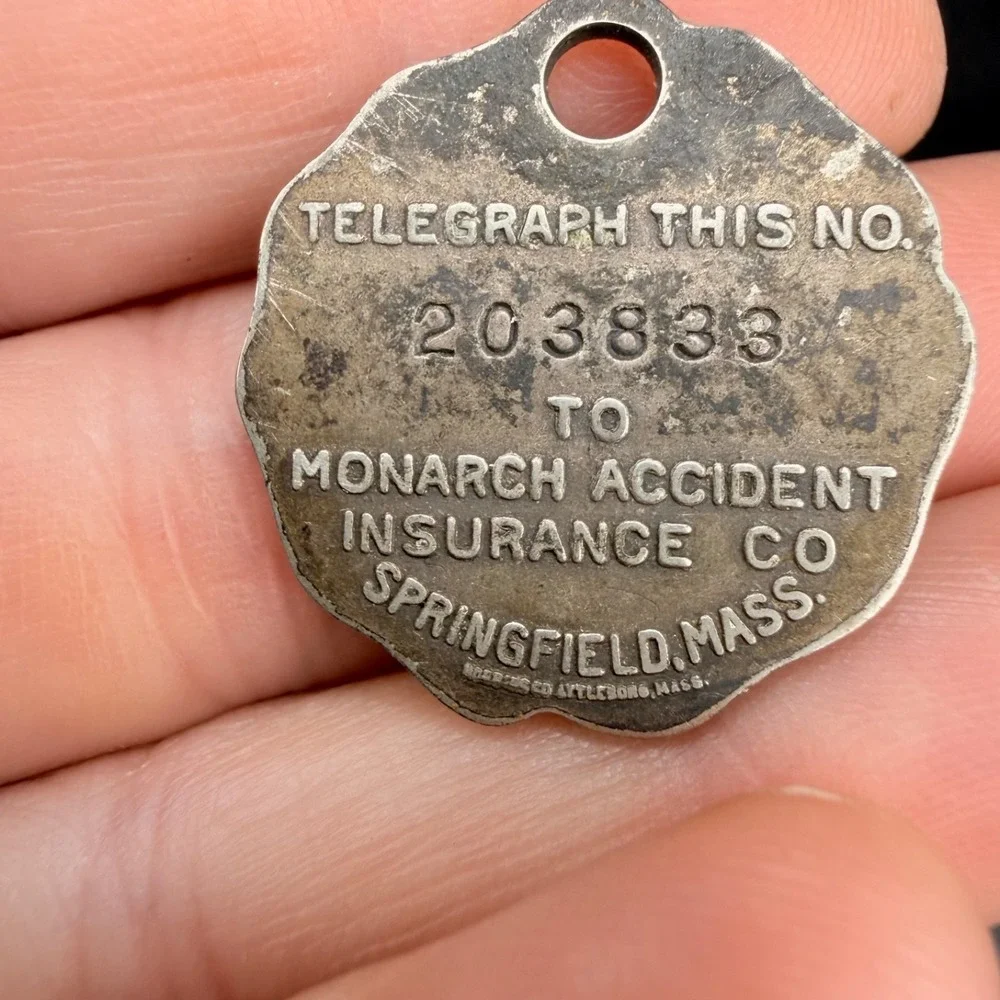 Vintage Monarch Accident Insurance Pendant Silver Tone Coin Fob Logo 1in
